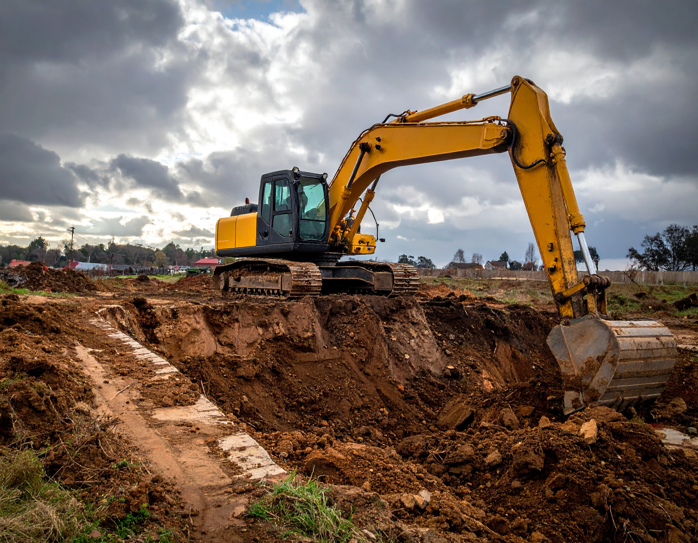 Ground Level Contracting crew and excavation equipment on a commercial civil site in Simcoe County Ontario